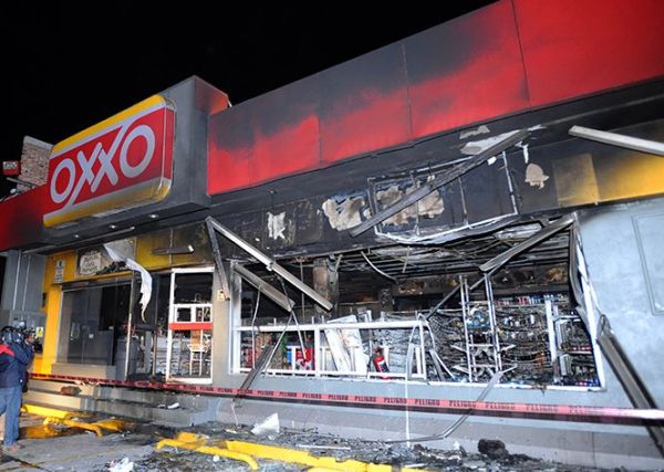 One of the Oxxo convenience stores that was firebombed in the State of Mexico on Sunday night. Oxxo-Mexico-attacked