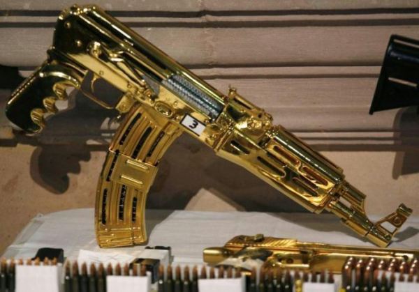 Authorities recovered a number of gold-plated military-grade firearms at Ye Gon's home.