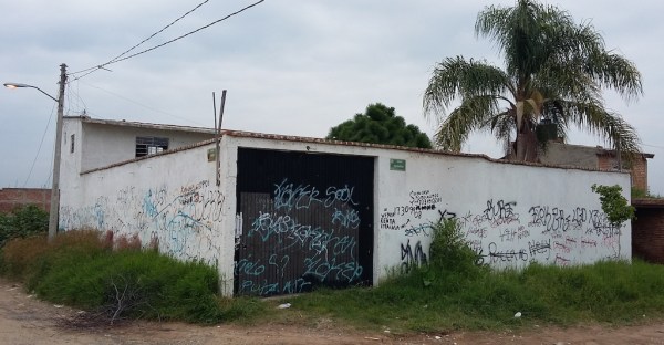Mexican authorities found human remains and containers with traces of acid at this property in Jalisco state.