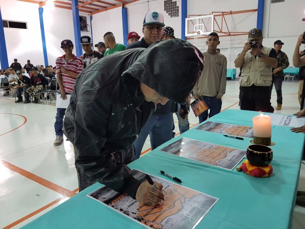 The leaders of 13 warring street gangs gathered to sign a truce in a gym hall in Monterrey in January.